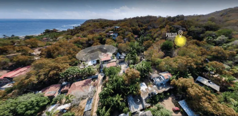 Terreno en Mazunte Oaxaca frente a la playa 3197 m2 vista aérea del predio Ubicación del terreno en Mazunte zona centro cerca de la playa y servicios Vista natural del terreno en Mazunte con vegetación y entorno ecoturístico Plano del terreno en Mazunte Oaxaca con superficie de 3197.79 m2 Terreno en venta Mazunte ideal para hotel cabañas o desarrollo turístico